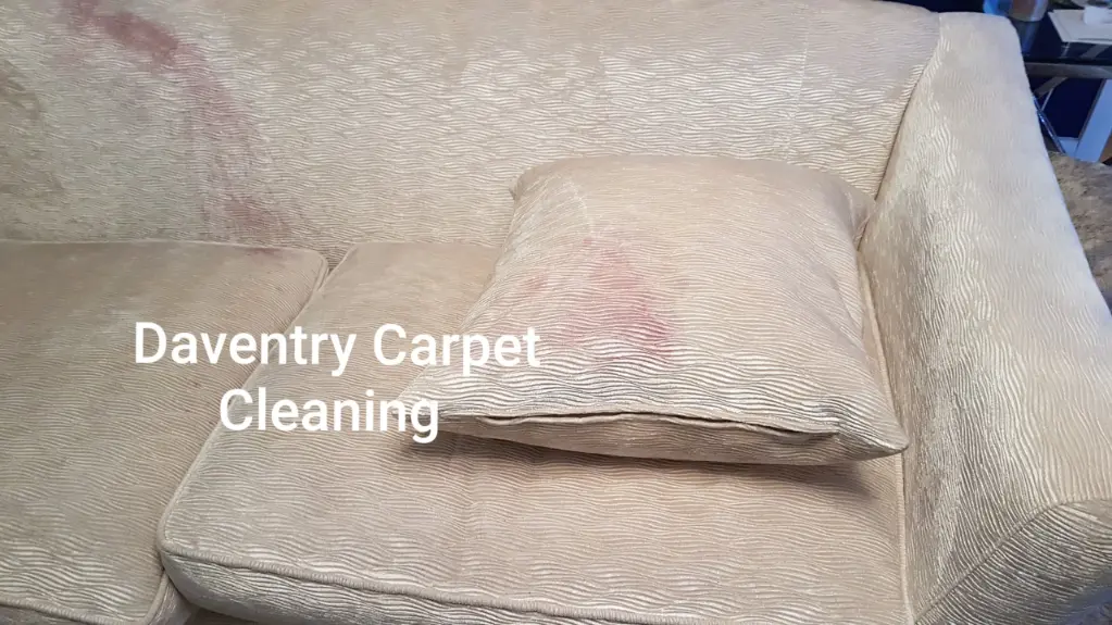 Designer sofa with wine spill to be cleaned by Daventry carpet cleaning